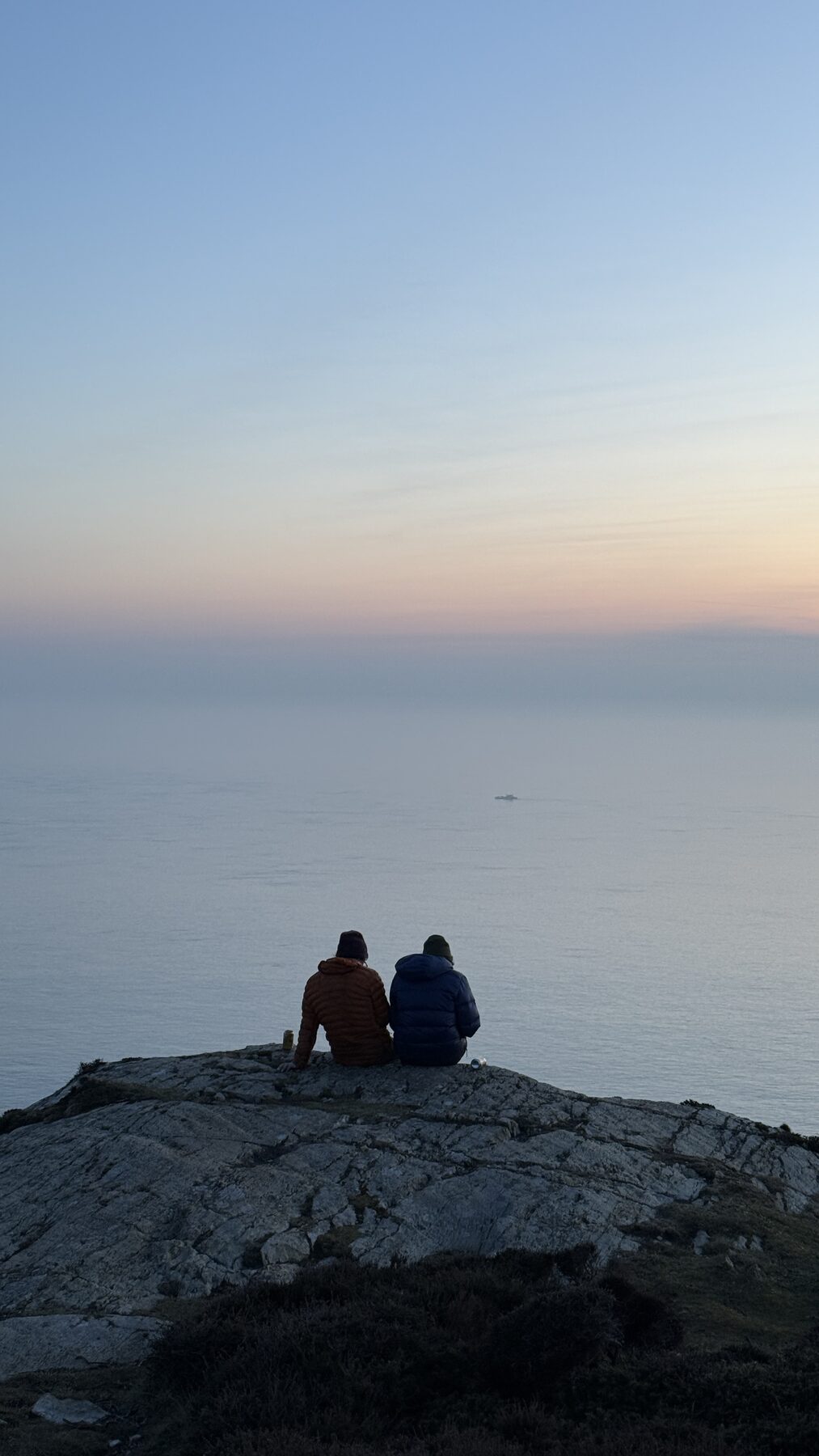 Sitting on the cliffs at dusk